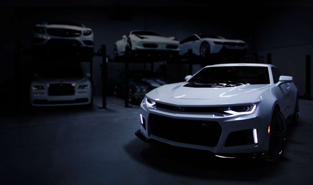 White luxury sedan with tinted windows